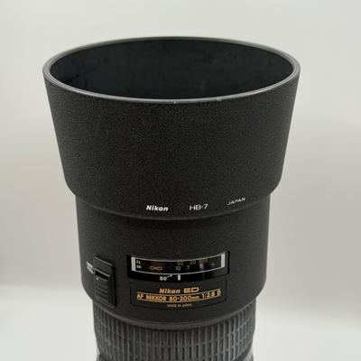 LOT 43: Nikon ED AF Nikkor 80-200mm 1:2.8 D f/2.8 Telephoto Lens w/ Quantaray 77mm UV Filter & Nikon HB-7 Lens Hood