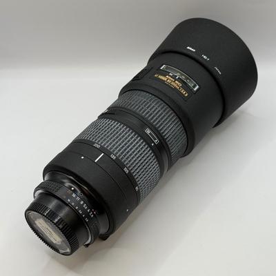 LOT 43: Nikon ED AF Nikkor 80-200mm 1:2.8 D f/2.8 Telephoto Lens w/ Quantaray 77mm UV Filter & Nikon HB-7 Lens Hood