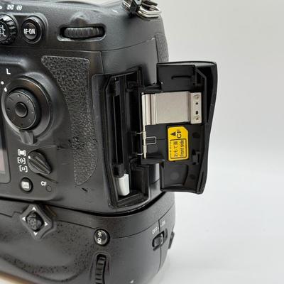 LOT 46: Nikon D700 DSLR Camera Body w/ Power2000 VP-MBD10 Vertical Battery Grip