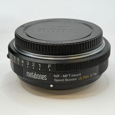 LOT 53: BlackMagic Design Pocket Cinema Camera 209-J00204 4k Video Camera, SmallRig Camera Cage & Metabones N/F-MFT Mount Speed...