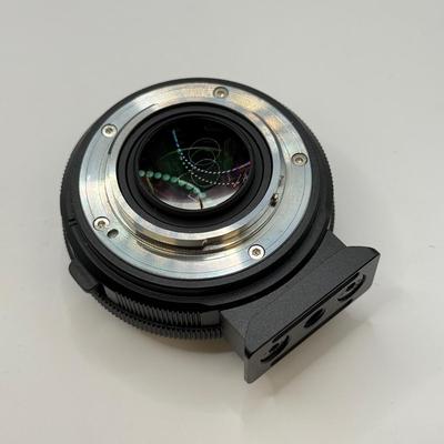 LOT 53: BlackMagic Design Pocket Cinema Camera 209-J00204 4k Video Camera, SmallRig Camera Cage & Metabones N/F-MFT Mount Speed...