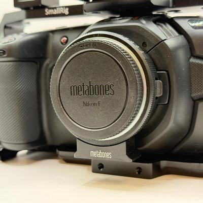 LOT 53: BlackMagic Design Pocket Cinema Camera 209-J00204 4k Video Camera, SmallRig Camera Cage & Metabones N/F-MFT Mount Speed...