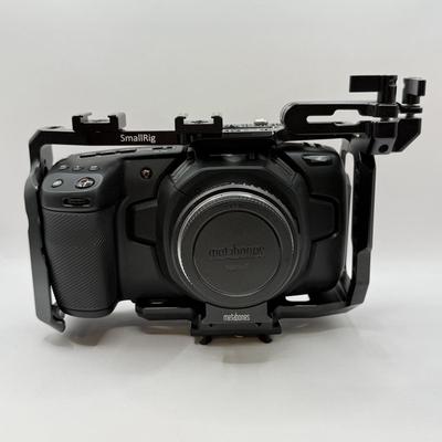 LOT 54: BlackMagic Design Pocket Cinema Camera 209-J00204 4k Video Camera, SmallRig Camera Cage & Metabones N/F-MFT Mount Speed...