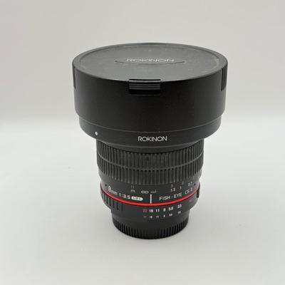 LOT 56: Rokinon 8mm 1:3.5 f/3.5 Fisheye CSII Lens w/ Hood (for Nikon Cameras)