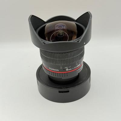 LOT 56: Rokinon 8mm 1:3.5 f/3.5 Fisheye CSII Lens w/ Hood (for Nikon Cameras)