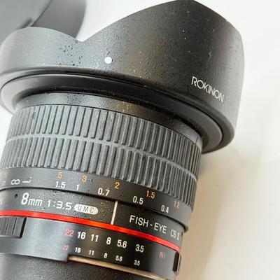 LOT 56: Rokinon 8mm 1:3.5 f/3.5 Fisheye CSII Lens w/ Hood (for Nikon Cameras)