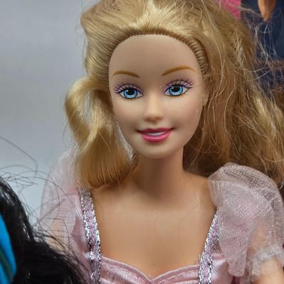 LOT 70: "Girls Just Wanna have Fun" Assortment of Barbies and Their Shoes...