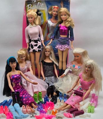 LOT 70: "Girls Just Wanna have Fun" Assortment of Barbies and Their Shoes...