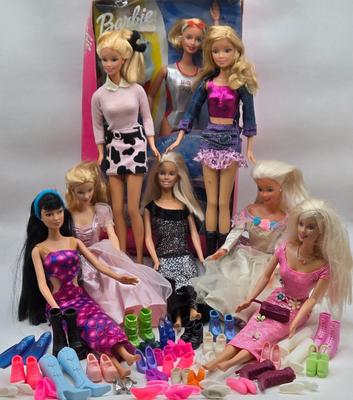 LOT 70: "Girls Just Wanna have Fun" Assortment of Barbies and Their Shoes...