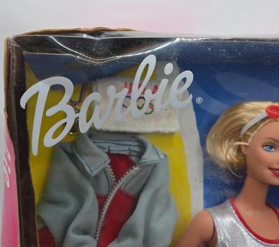 LOT 70: "Girls Just Wanna have Fun" Assortment of Barbies and Their Shoes...
