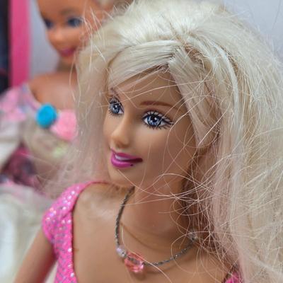 LOT 70: "Girls Just Wanna have Fun" Assortment of Barbies and Their Shoes...