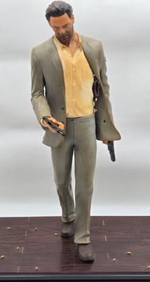 LOT 75: Hitman Agent 47 Statue, FarCry 4 Pagan Figurine, Max Payne 3 Statue, and Hitman 2 Accessories in Box
