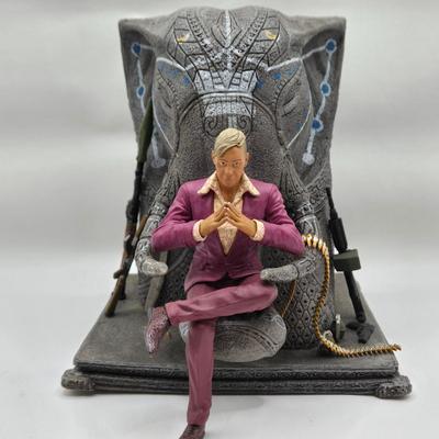 LOT 75: Hitman Agent 47 Statue, FarCry 4 Pagan Figurine, Max Payne 3 Statue, and Hitman 2 Accessories in Box