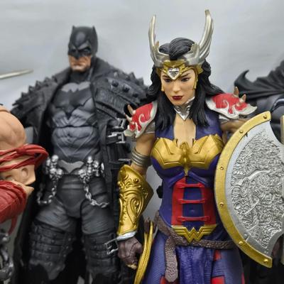 LOT 80: Large Variety of Action Figures Including Superman, Robin, Green Lantern, Many Anti-Heroes, and More