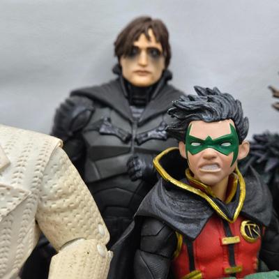 LOT 80: Large Variety of Action Figures Including Superman, Robin, Green Lantern, Many Anti-Heroes, and More