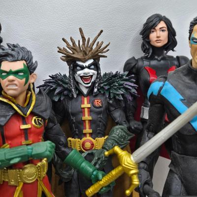 LOT 80: Large Variety of Action Figures Including Superman, Robin, Green Lantern, Many Anti-Heroes, and More