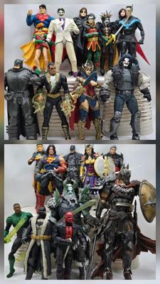 LOT 80: Large Variety of Action Figures Including Superman, Robin, Green Lantern, Many Anti-Heroes, and More