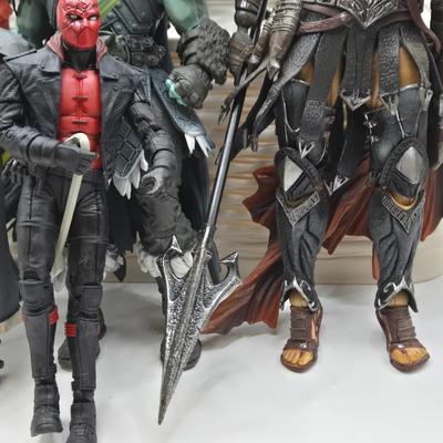 LOT 80: Large Variety of Action Figures Including Superman, Robin, Green Lantern, Many Anti-Heroes, and More