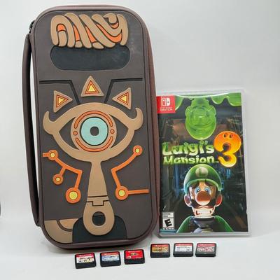 LOT 82: Legend of Zelda Nintendo Switch Case, Luigi's Mansion 3 w/ Case & More Nintendo Switch Games: Breath of the Wild, Super...