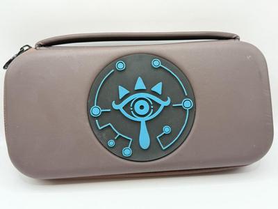 LOT 82: Legend of Zelda Nintendo Switch Case, Luigi's Mansion 3 w/ Case & More Nintendo Switch Games: Breath of the Wild, Super...