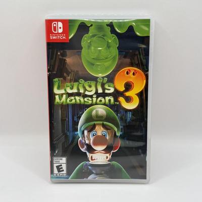 LOT 82: Legend of Zelda Nintendo Switch Case, Luigi's Mansion 3 w/ Case & More Nintendo Switch Games: Breath of the Wild, Super...