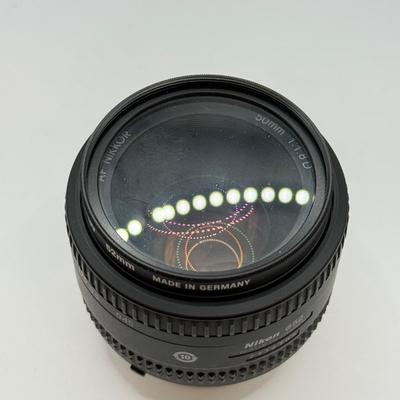 LOT 83: Nikon AF Nikkor 50mm 1:1.8 D f/1.8 Prime Lens w/ 52mm Calumet Traditional UV Filter & Nikon Speedlight SB-600 External Flash