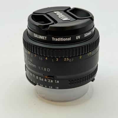 LOT 83: Nikon AF Nikkor 50mm 1:1.8 D f/1.8 Prime Lens w/ 52mm Calumet Traditional UV Filter & Nikon Speedlight SB-600 External Flash
