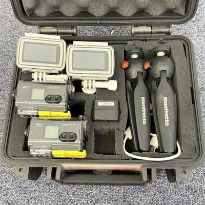 LOT 92: 2 Yi 4k Action Cameras Model YAS.1616.INT, 2 Sony Exmor R SteadyShot HDR-AS20 Cameras w/ Case & 2 Mini Manfrotto Tripods