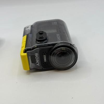 LOT 92: 2 Yi 4k Action Cameras Model YAS.1616.INT, 2 Sony Exmor R SteadyShot HDR-AS20 Cameras w/ Case & 2 Mini Manfrotto Tripods