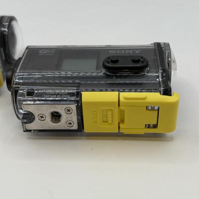 LOT 92: 2 Yi 4k Action Cameras Model YAS.1616.INT, 2 Sony Exmor R SteadyShot HDR-AS20 Cameras w/ Case & 2 Mini Manfrotto Tripods