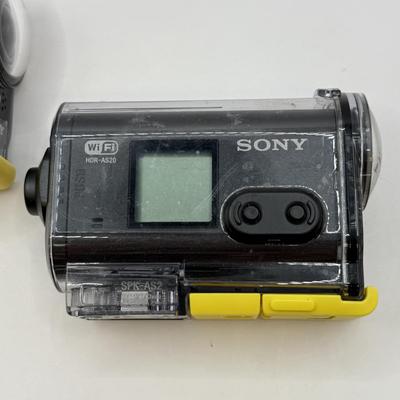 LOT 92: 2 Yi 4k Action Cameras Model YAS.1616.INT, 2 Sony Exmor R SteadyShot HDR-AS20 Cameras w/ Case & 2 Mini Manfrotto Tripods