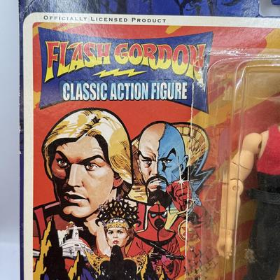LOT 93: Flash Gordon Classic Action Figure, Gritty Chia Pet, Pop! Jessica Rabbit Giant Enamel Pin, Robotech VF-11 & More