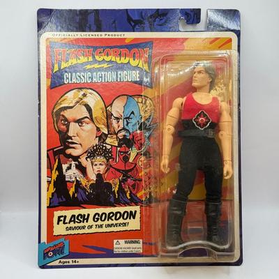 LOT 93: Flash Gordon Classic Action Figure, Gritty Chia Pet, Pop! Jessica Rabbit Giant Enamel Pin, Robotech VF-11 & More