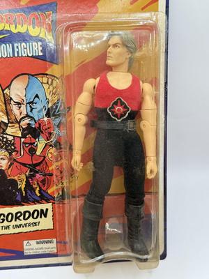 LOT 93: Flash Gordon Classic Action Figure, Gritty Chia Pet, Pop! Jessica Rabbit Giant Enamel Pin, Robotech VF-11 & More