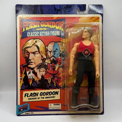 LOT 93: Flash Gordon Classic Action Figure, Gritty Chia Pet, Pop! Jessica Rabbit Giant Enamel Pin, Robotech VF-11 & More