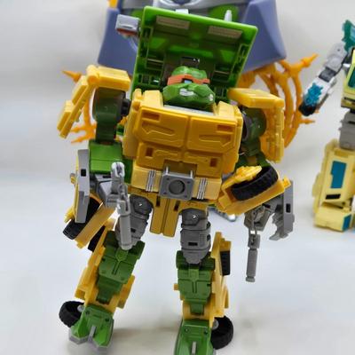 LOT 124: Large Variety of Transformers and Other Toys