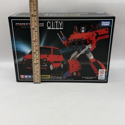 LOT 166: NIB Takara Tomy Transformers Masterpiece City MP-54 Cybertron Citadel Guardian Reboost
