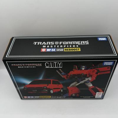 LOT 166: NIB Takara Tomy Transformers Masterpiece City MP-54 Cybertron Citadel Guardian Reboost