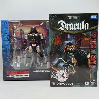 LOT 174: NIB Hasbro Transformers: Universal Monsters Takara Tomy Dracula Draculus & Generations War on Cybertron Trilogy Covert Agent...