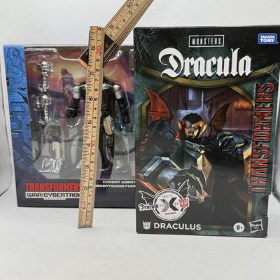 LOT 174: NIB Hasbro Transformers: Universal Monsters Takara Tomy Dracula Draculus & Generations War on Cybertron Trilogy Covert Agent...