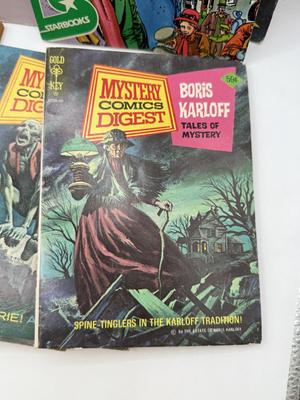 LOT 177: Strange & Mysterious Books: Mystery Comics Digest, UFO Magazines, A Christmas Carol & Dracula