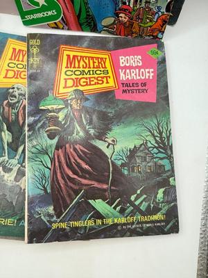 LOT 177: Strange & Mysterious Books: Mystery Comics Digest, UFO Magazines, A Christmas Carol & Dracula