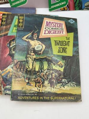 LOT 177: Strange & Mysterious Books: Mystery Comics Digest, UFO Magazines, A Christmas Carol & Dracula