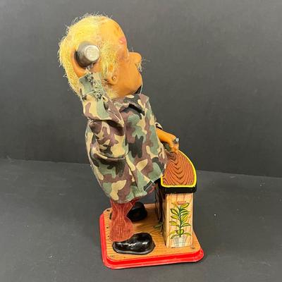 LOT 194: Vintage Tin Toys, Cast iron Soldier