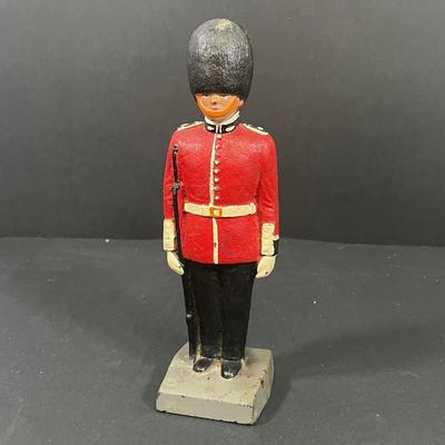 LOT 194: Vintage Tin Toys, Cast iron Soldier