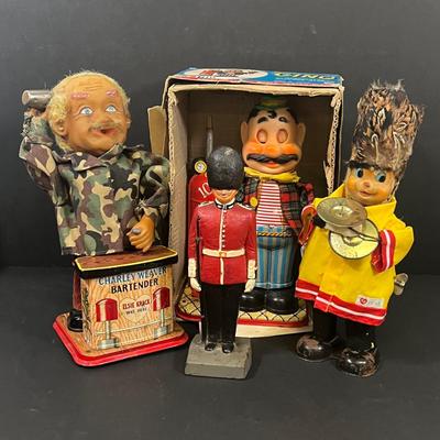 LOT 194: Vintage Tin Toys, Cast iron Soldier