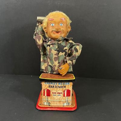 LOT 194: Vintage Tin Toys, Cast iron Soldier
