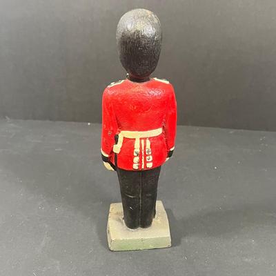 LOT 194: Vintage Tin Toys, Cast iron Soldier