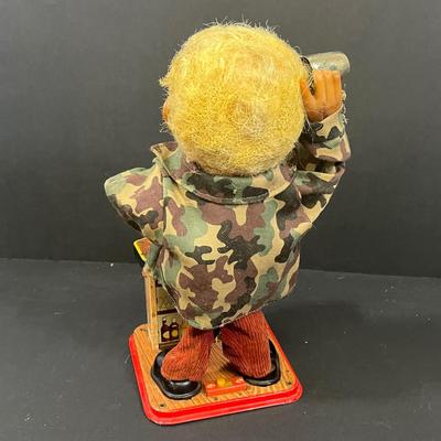 LOT 194: Vintage Tin Toys, Cast iron Soldier