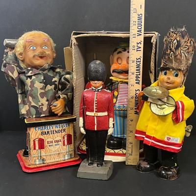 LOT 194: Vintage Tin Toys, Cast iron Soldier